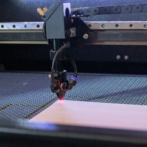 How do I set up and use a laser cutter at home