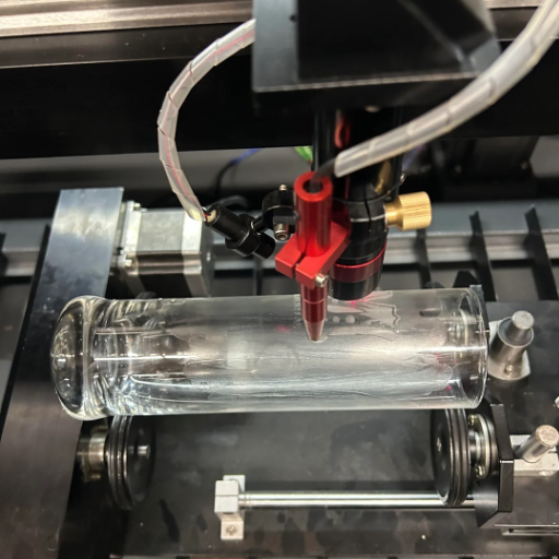 What is a rotary laser engraver, and how does it work?