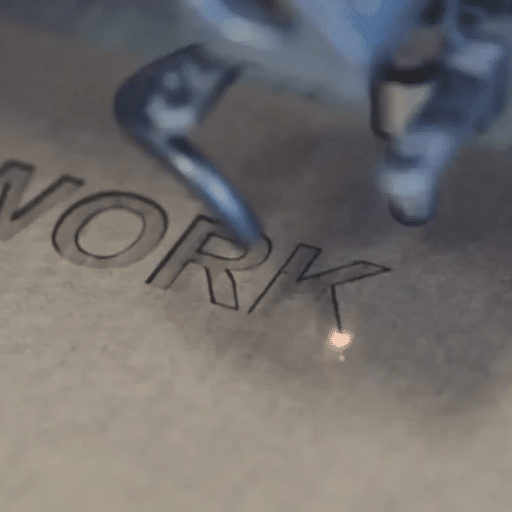 What is laser engraving and how does it differ from marking?